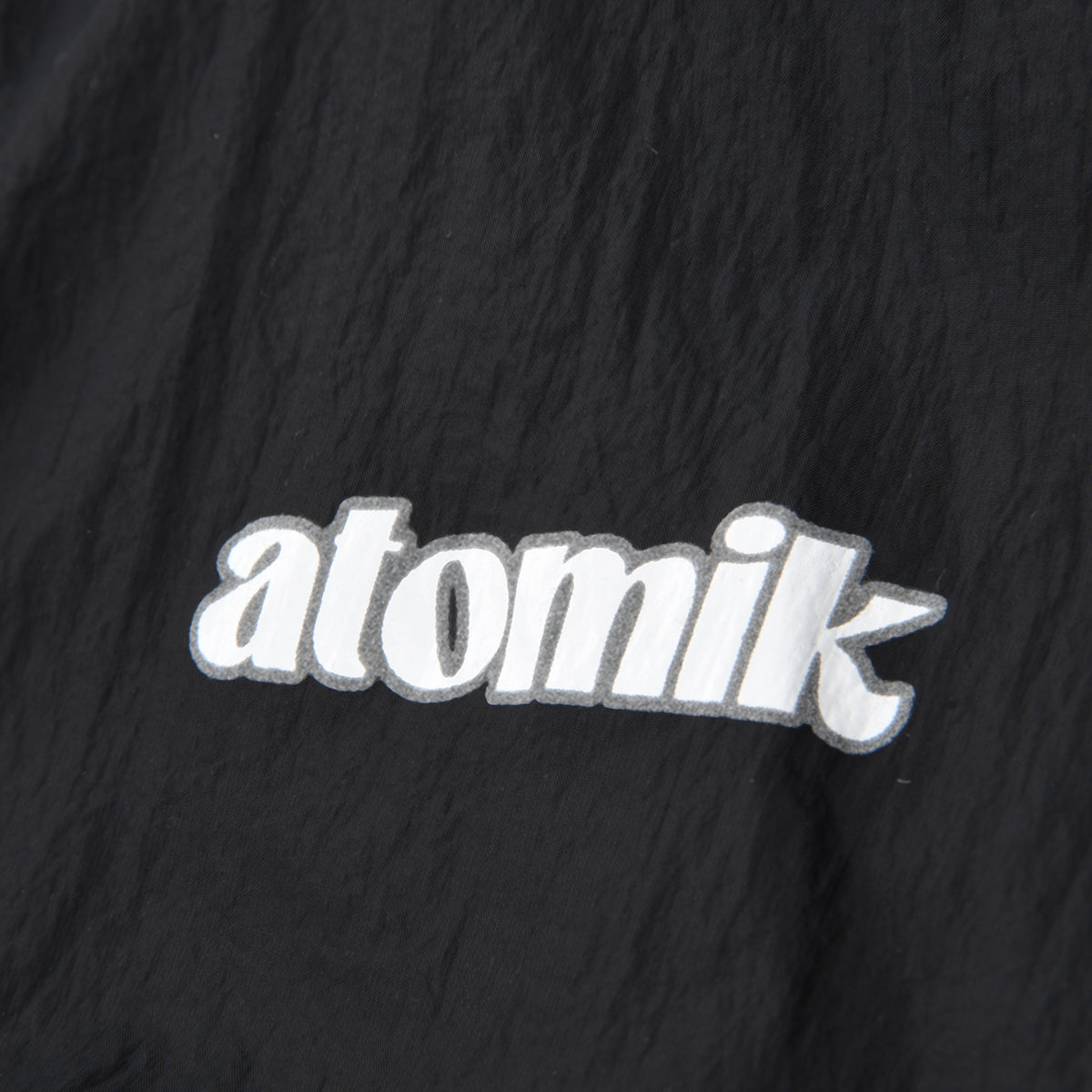 Campera Atomik Soft Windbreaker Niña con capucha