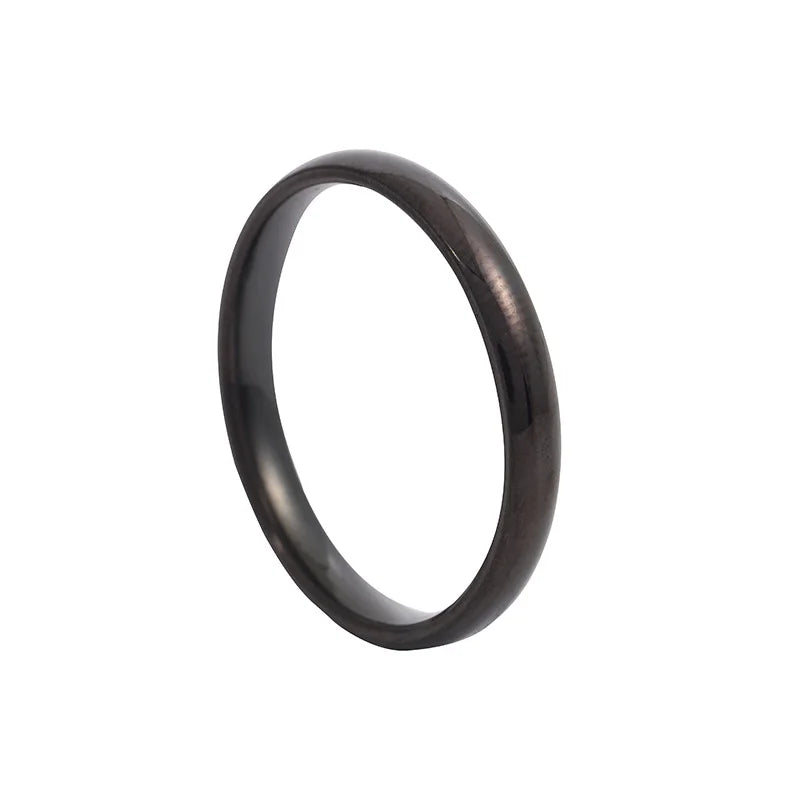 Anillo de acero inoxidable pulido en tonos dorado, rosa y negro