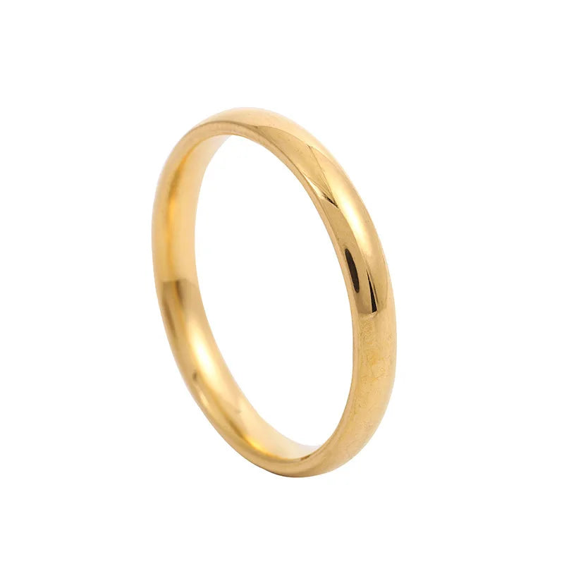 Anillo de acero inoxidable pulido en tonos dorado, rosa y negro
