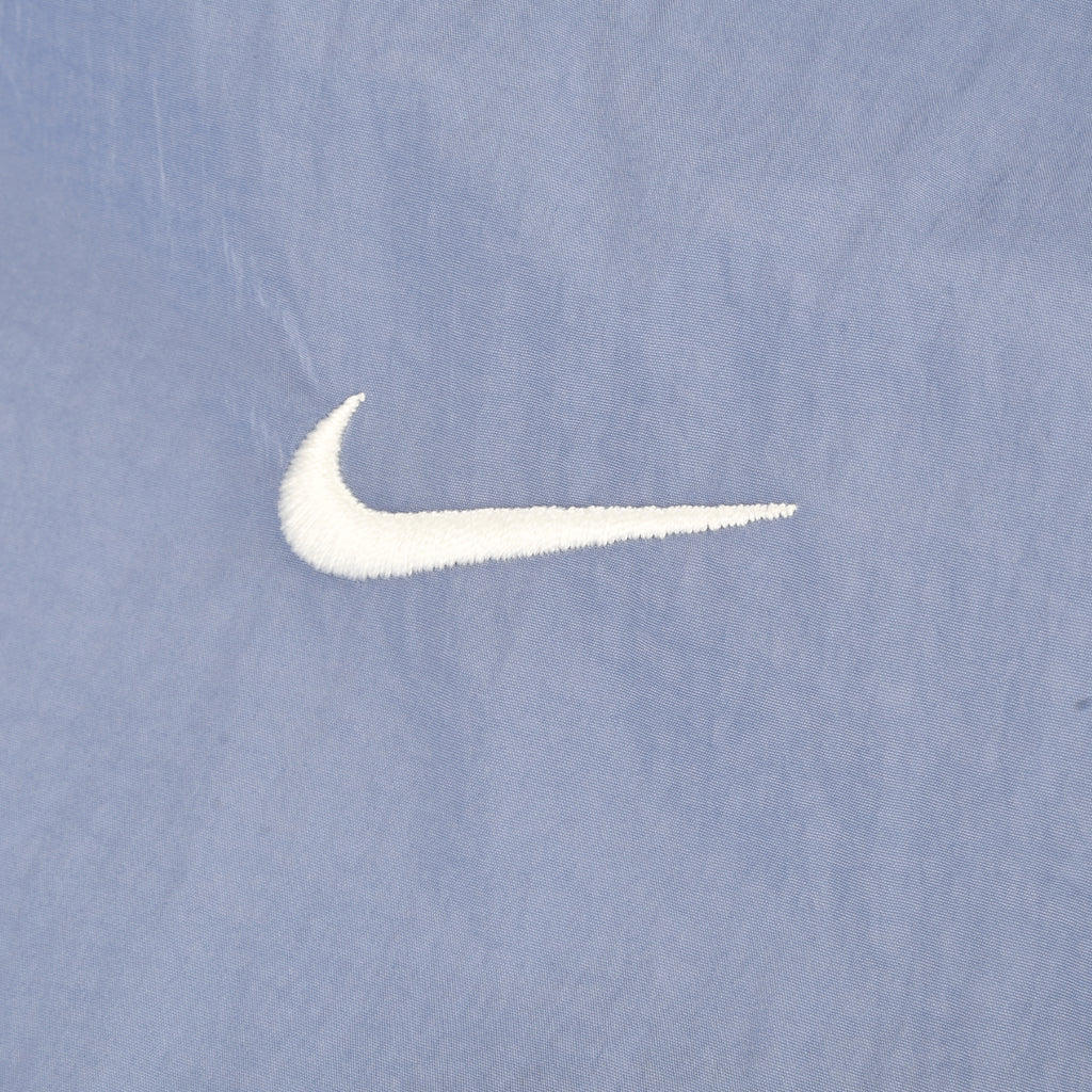 Campera Nike Rompeviento Windrunner Mujer