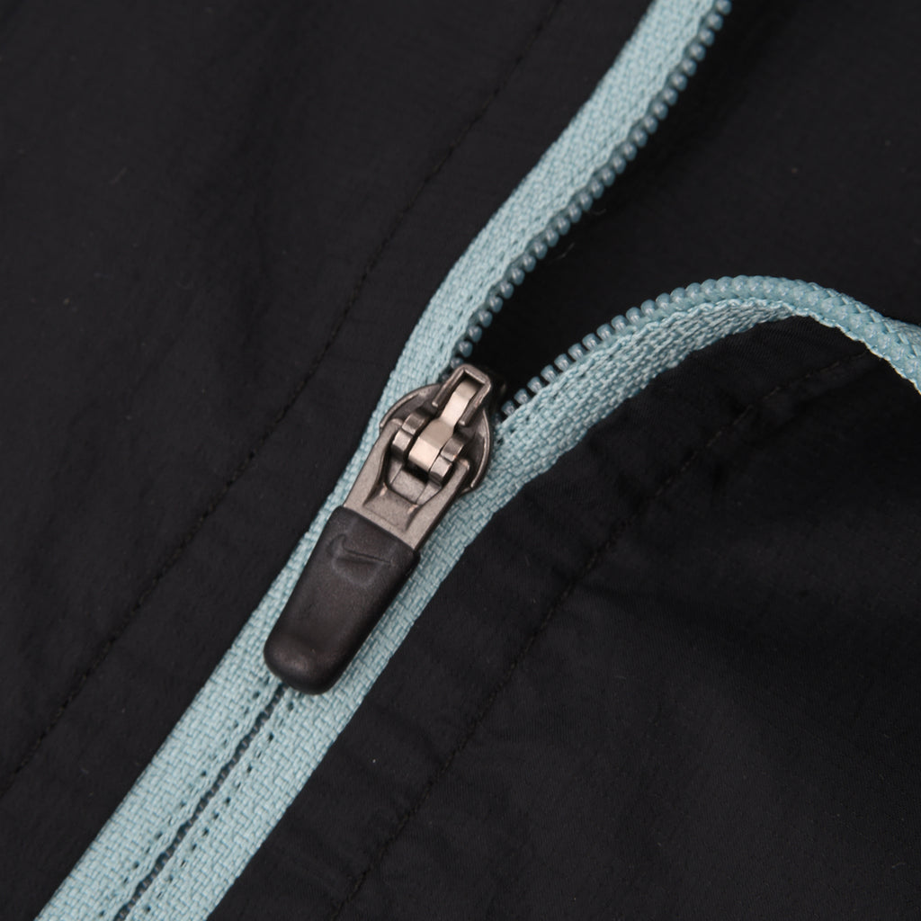 Campera Running Nike Rompevientos UV Repel Stride Hombre