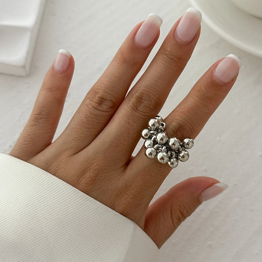 Anillo abierto unisex con esfera pequeña y diseño geométrico