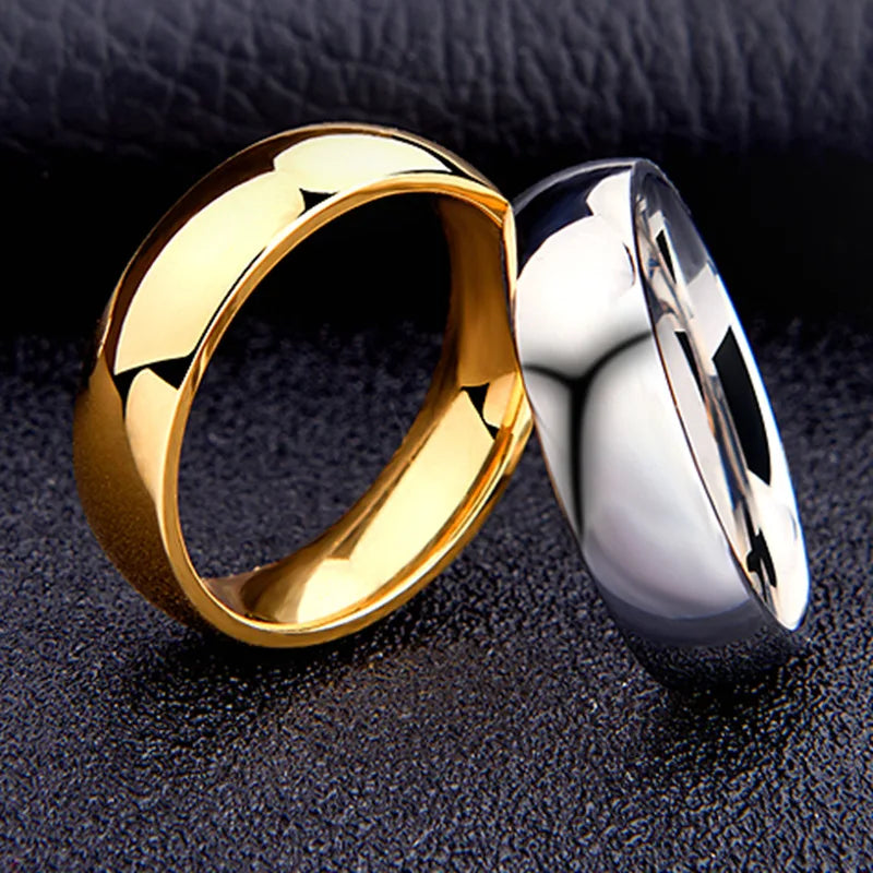 Anillo de acero inoxidable pulido en tonos dorado, rosa y negro