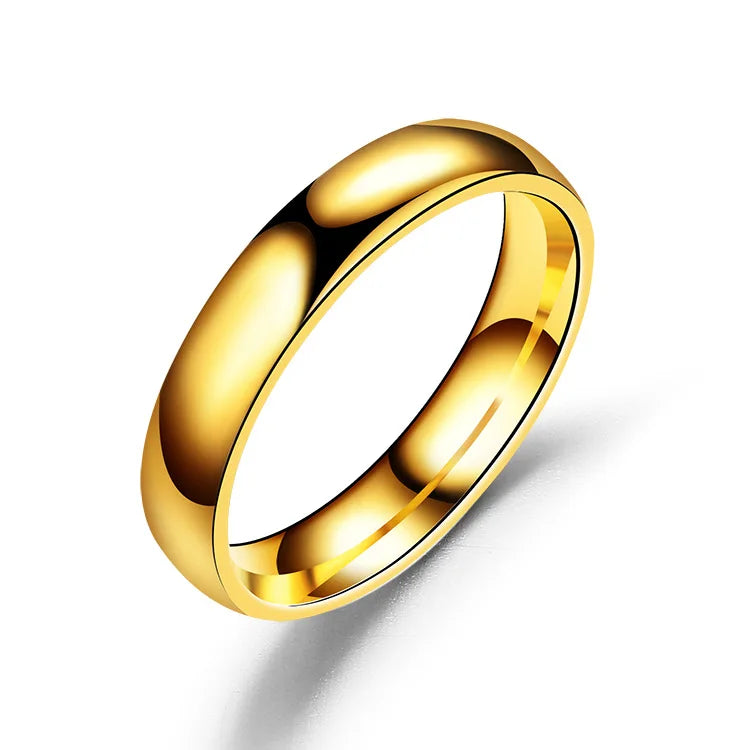 Anillo de acero inoxidable pulido en tonos dorado, rosa y negro