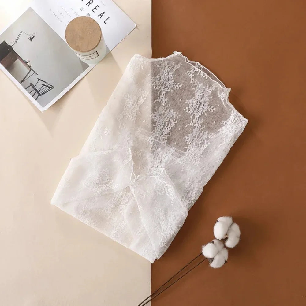 Remera de mujer transparente de encaje con manga larga
