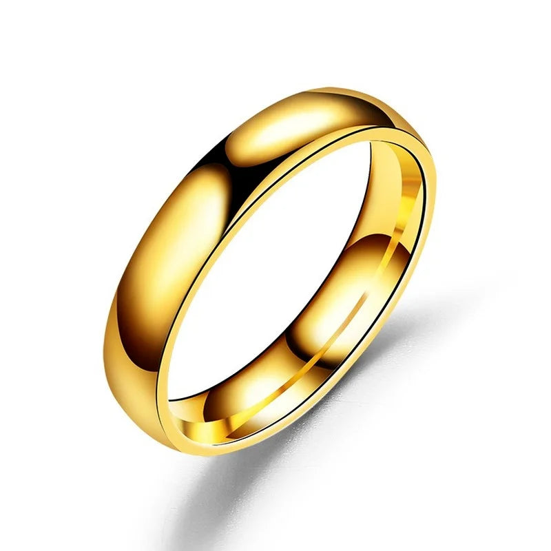 Anillo de acero inoxidable pulido en tonos dorado, rosa y negro