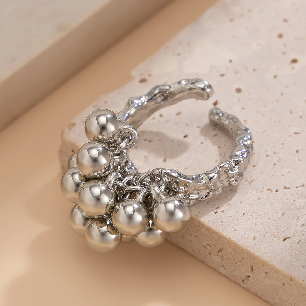 Anillo abierto unisex con esfera pequeña y diseño geométrico