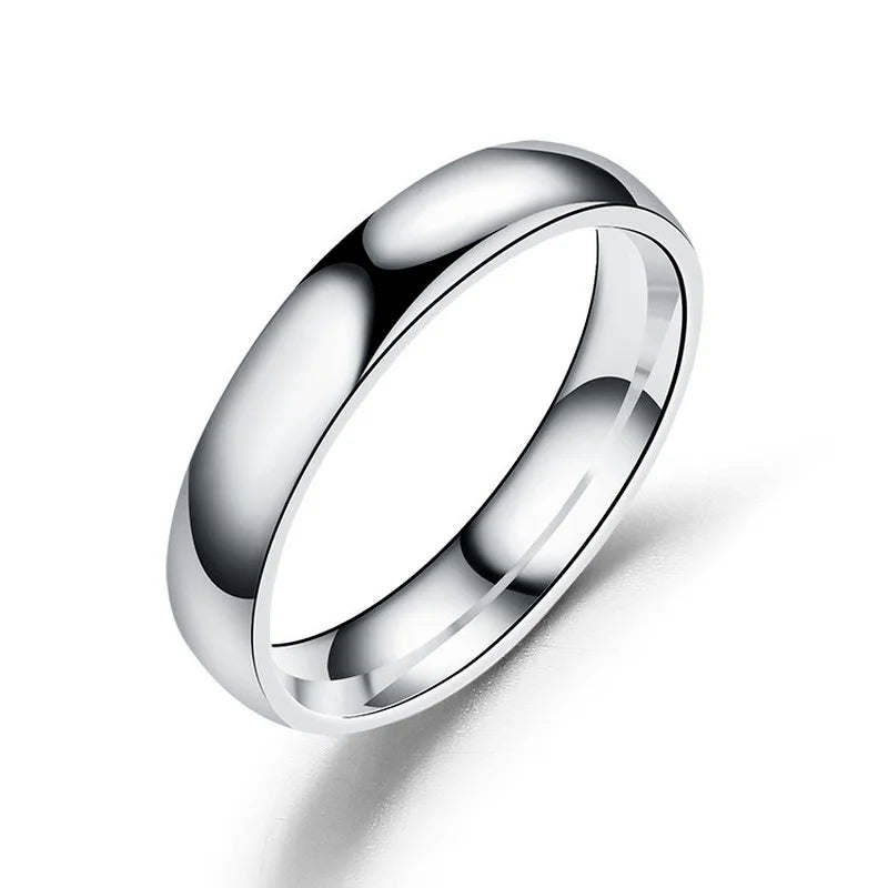 Anillo de acero inoxidable pulido en tonos dorado, rosa y negro