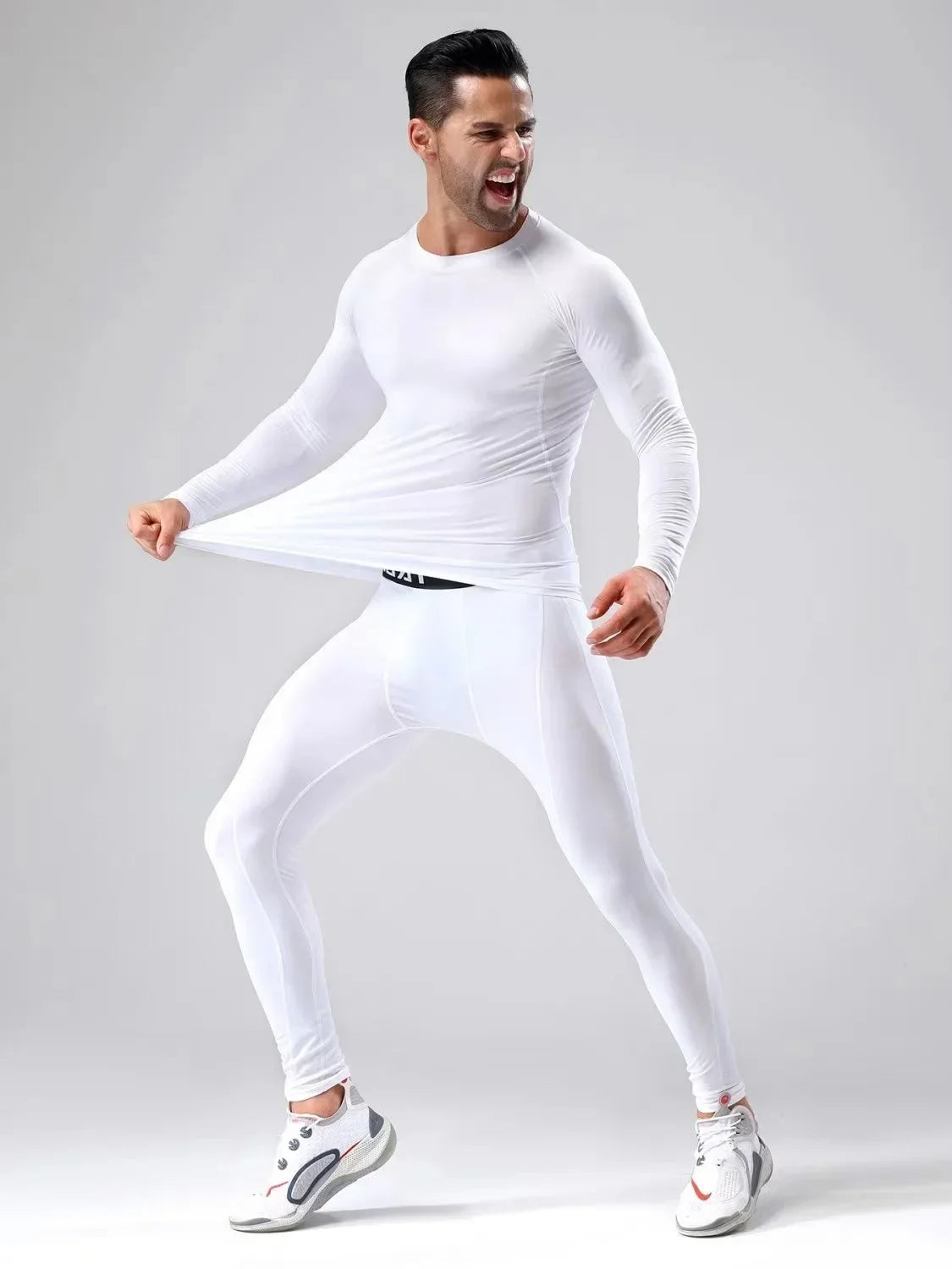 Conjunto deportivo de compresión para hombre, remera y calza elastizada