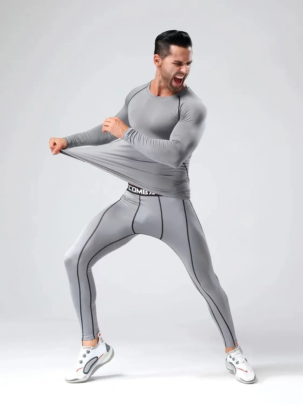 Conjunto deportivo de compresión para hombre, remera y calza elastizada